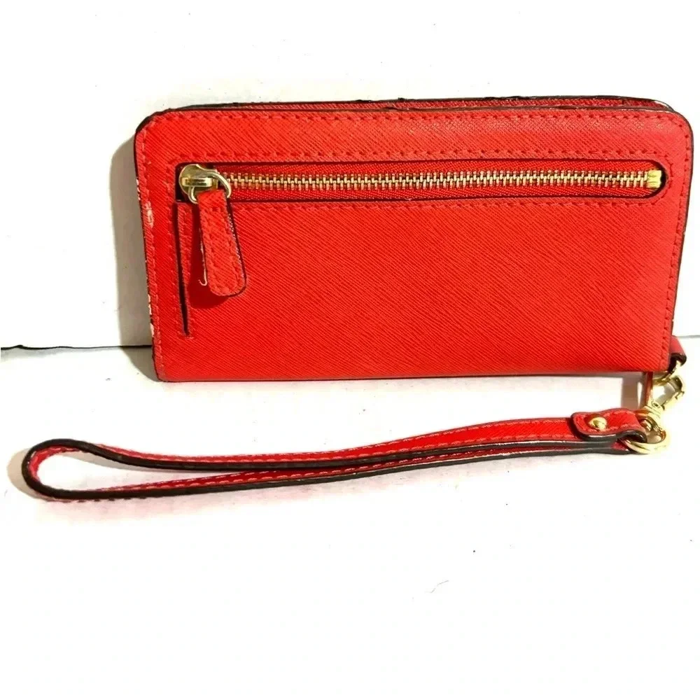 Michael Kors orange leather leather wristlet wallet
